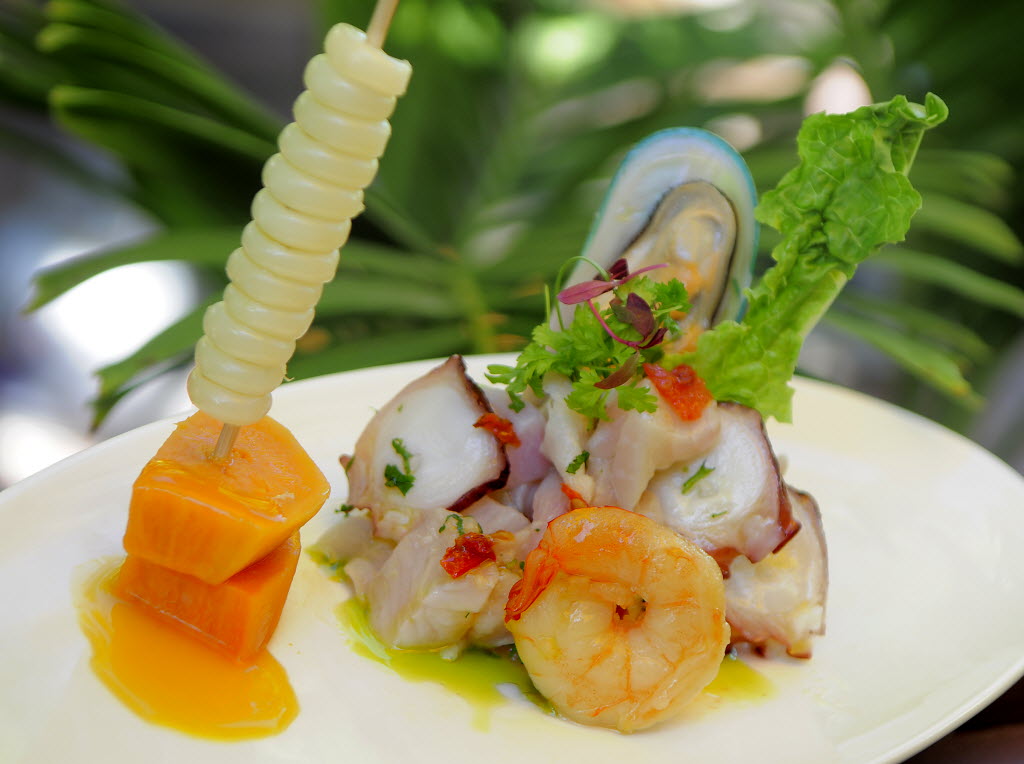 (Dec 9, 2010) (Sarasota Herald-Tribune photo by Dan Wagner) Mixed ceviche, including fresh fish, shrimp, mussels and octopus, in yellow pepper lime juice with cilantro, red onions, Cuzco corn and yam is served at The Cottage on the Key.