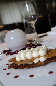 An almond nougatine with lemon curd mousse and a raspberry coulis is a specialty of the day at Maison Blanche. (2.2.10; STAFF PHOTO / E. SKYLAR LITHERLAND)