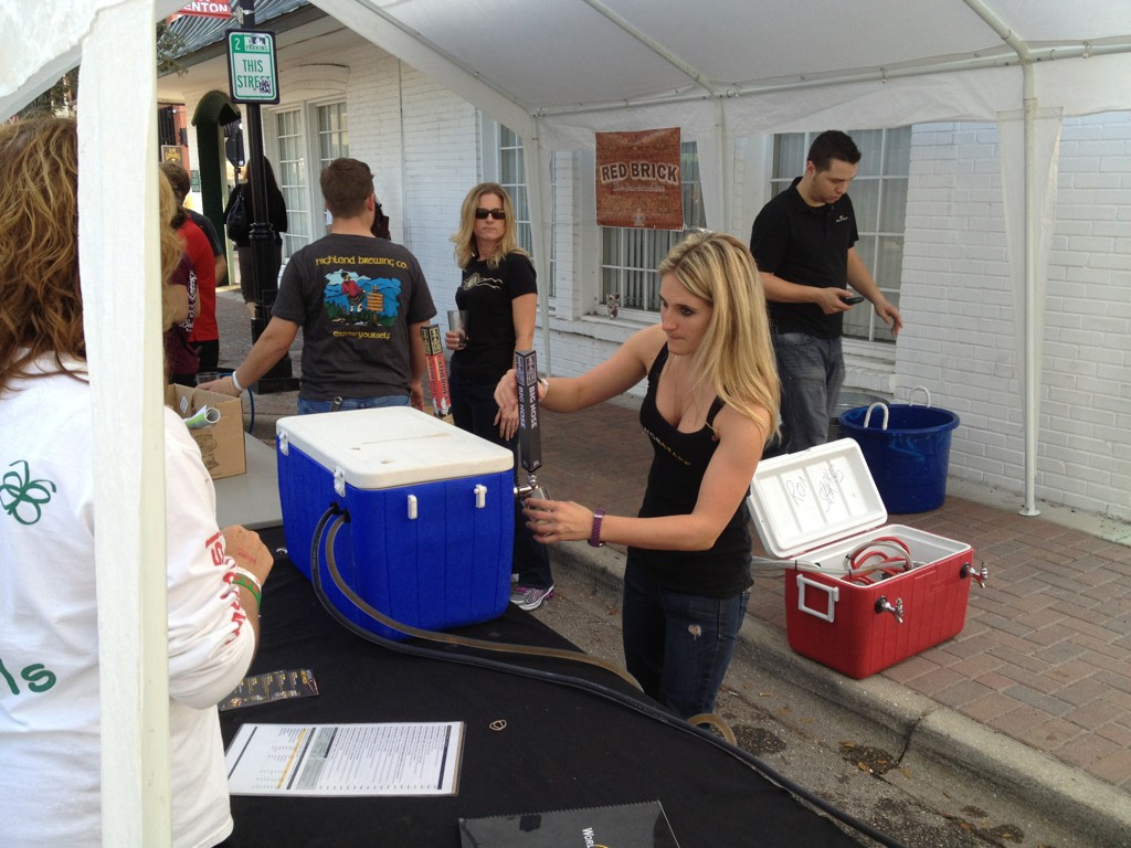 world of beer pouring Swamp Head