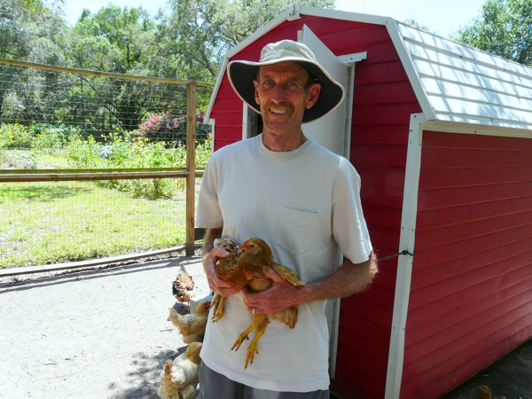 COOPED UP: Peter Burkard in his backyard chicken coop / COOPER LEVEY-BAKER