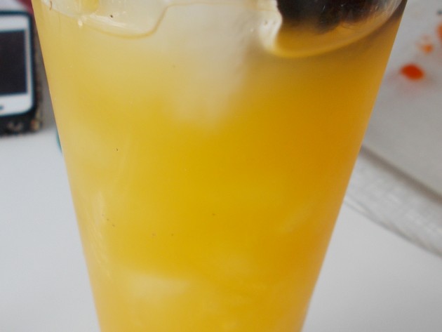 Happy hour sangria features pear and mango nectars, chunks of fruit on the bottom and a blackberry garnish (also $5).
