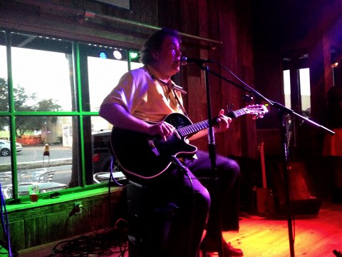 Between appetizer and entree I was able to drag myself away from the table to snap this picture of Steve Arvey, performing solo at the grand opening.