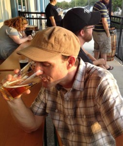 Jake Loomis of Sarasota enjoys a Humidor IPA at El Catador day. STAFF PHOTO / KAT DOW