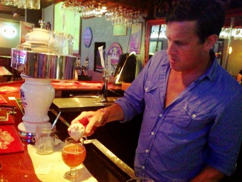 Joseph Arnegger whips up a beer float with Ben & Jerry's ice cream at the Tavern on Main.