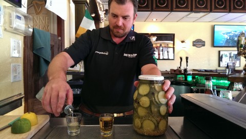 Ross making pickle shot