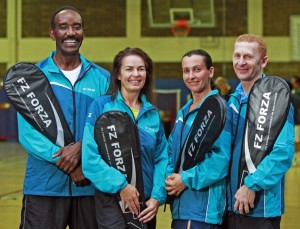 Badminton coach Watkins Fessal of Clermont and Sue Dickson of Orlando with Krisztina Ihaszy and Sandor Jakovics. (Staff Photo by Thomas Bender)